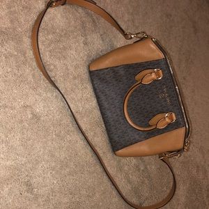 It’s a lovely Micheal kors bag, an Acorn brownish color and matches with things.